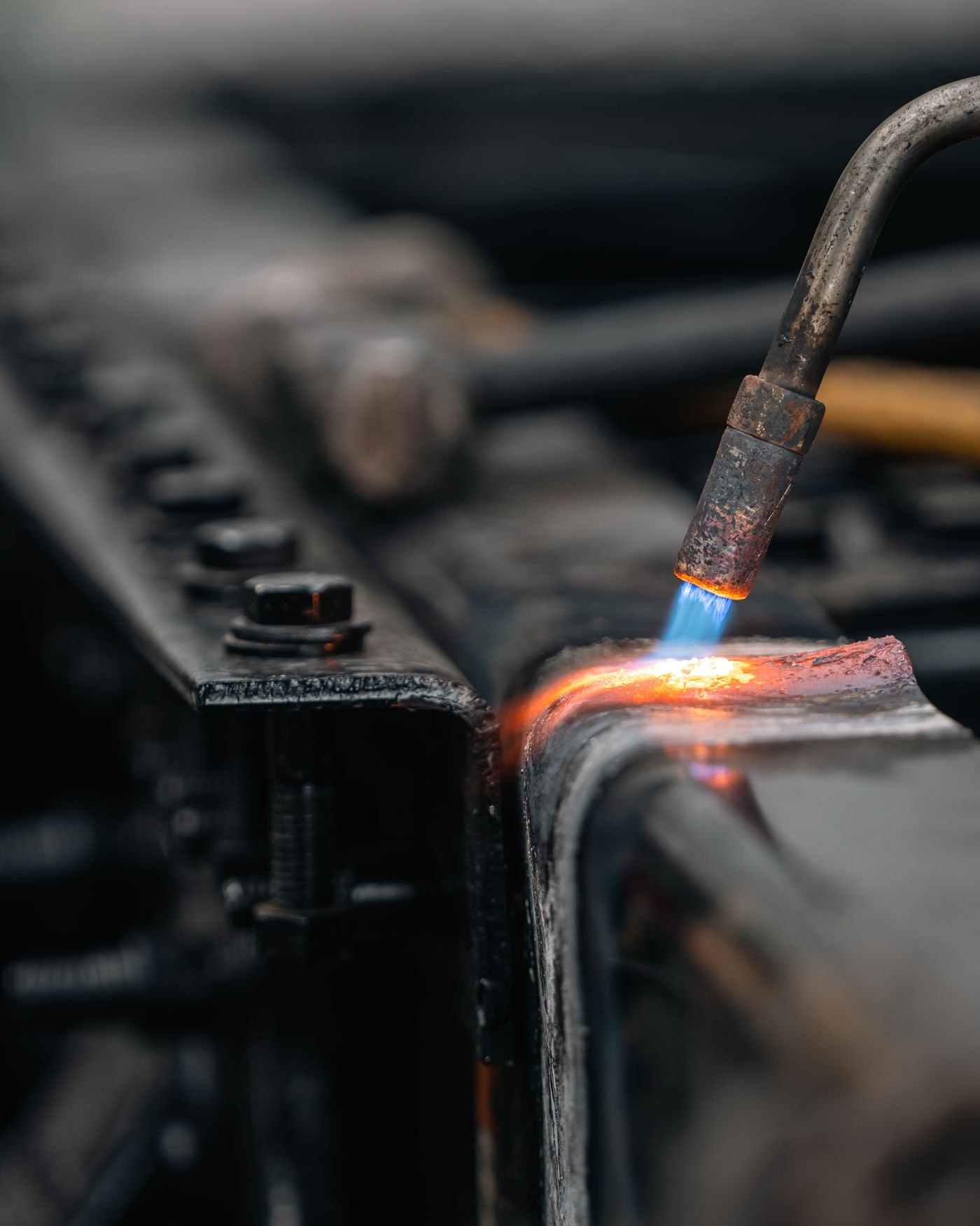 Torch flame on a metal part